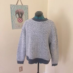 Pale grayish blue shearling textured sweatshirt